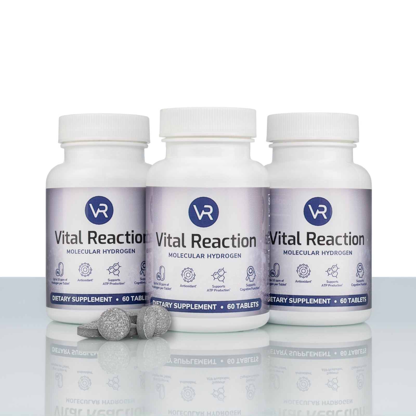 H2 tablets in front of 3 vital reaction molecular hydrogen tablet bottles
