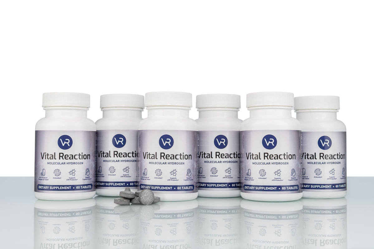H2 tablets in front of 6 vital reaction molecular hydrogen tablet bottles